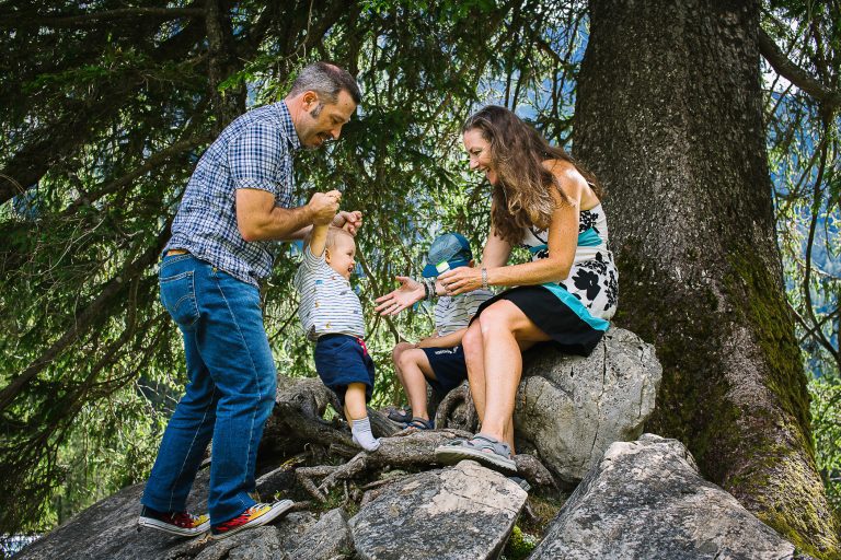 Family climb on rocks