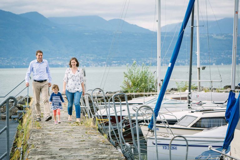 Family photo by boats