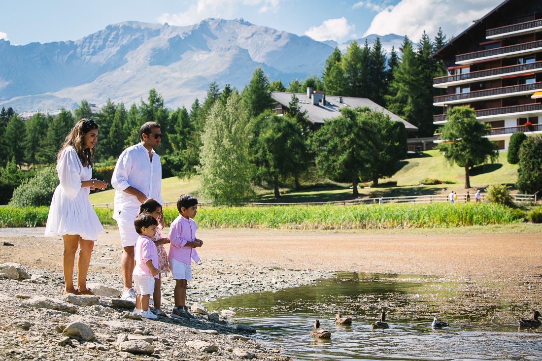 Family by the lake in Crans Montana